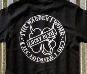 Lucky Devil "The Harder I Work" Black T-Shirt with White Logo.